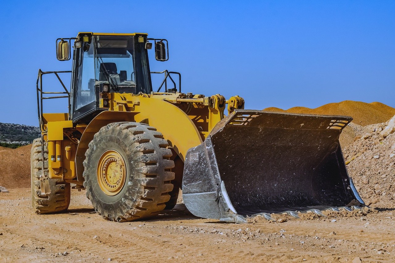 bulldozer, dozer loader, gravel pit, construction site, heavy tractor, heavy machine, heavy equipment, heavy machinery, construction machine, construction vehicle, bulldozer, bulldozer, bulldozer, bulldozer, bulldozer, heavy equipment